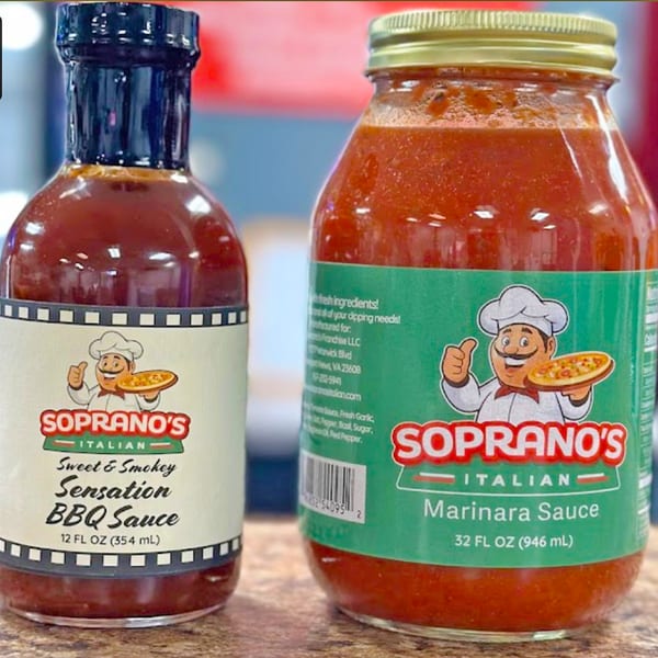 Soprano's Italian Sweet & Smokey Sensation BBQ Sauce and Marinara Sauce bottles.