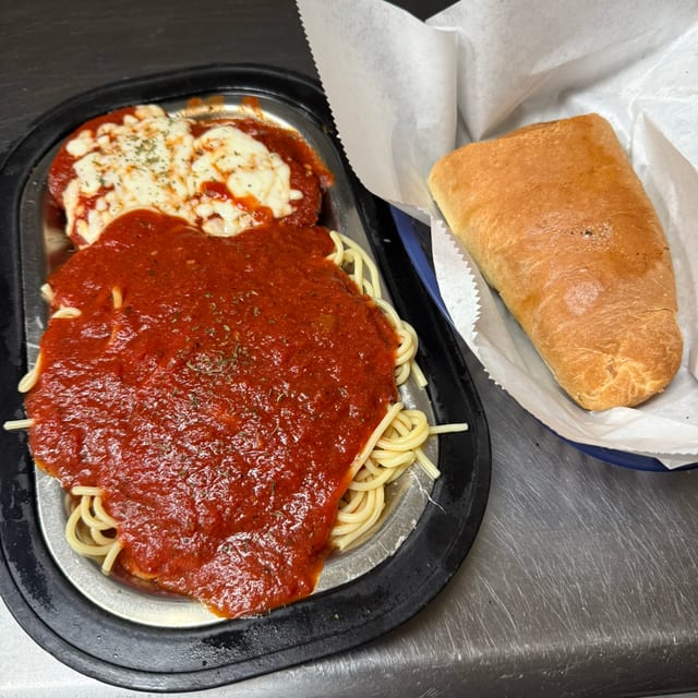 Chicken Parmigiana with Salad & Bread.