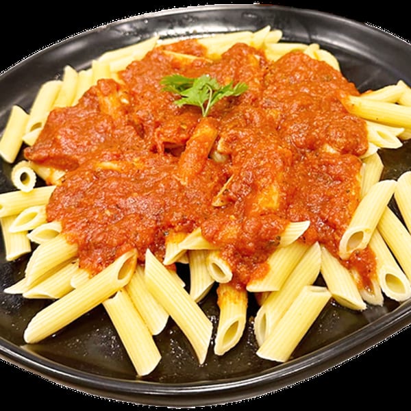 Penne pasta with a rich red tomato sauce and a sprig of parsley on a black plate.
