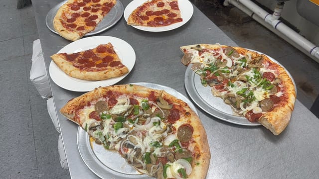 Slices of Meat Lover's Combo & Drink Lunch.