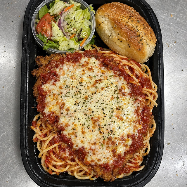 Veal Parmigiana with Salad & Bread.