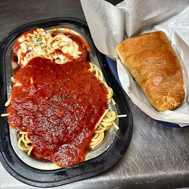 Chicken Parmigiana with Salad & Bread.